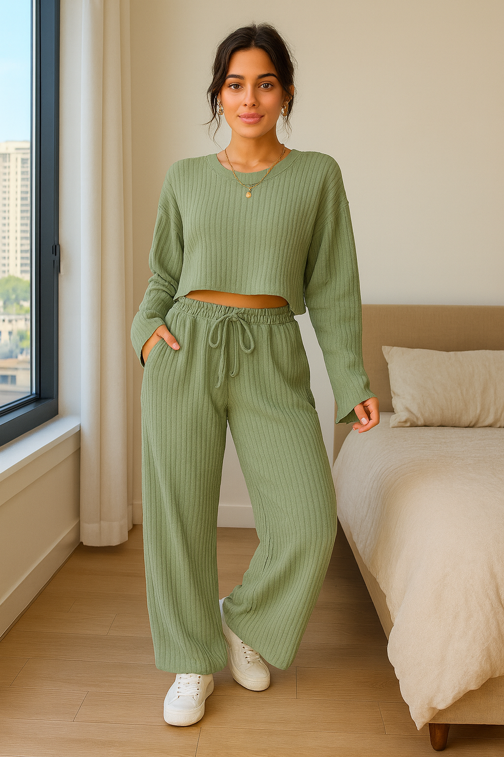 woman wearing a bean green ribbed loungewear set indoor.