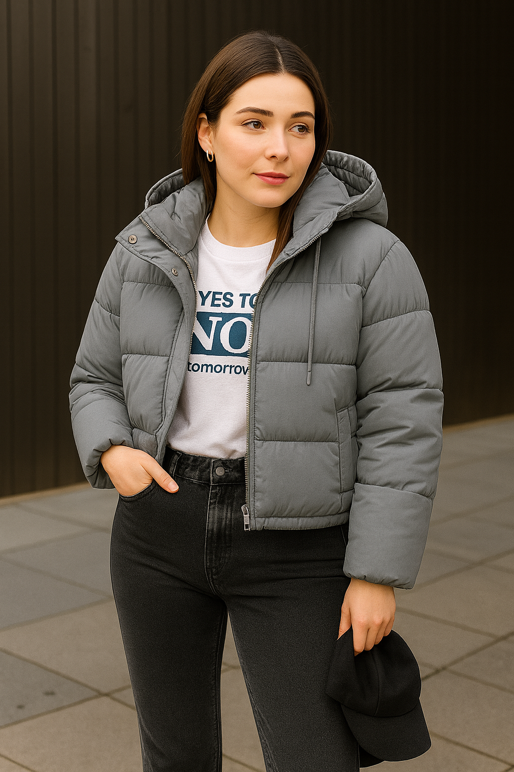 woman wearing a gray winter puffer jacket with soft fur trim